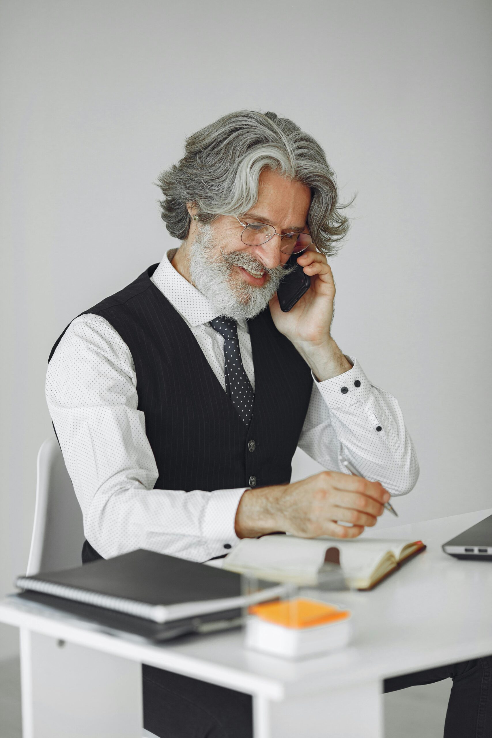 Professional businessman discussing business sale strategies on the phone